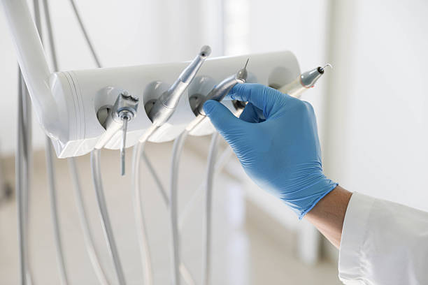 Professional Dental Implants technician working in Coral Hills, MD